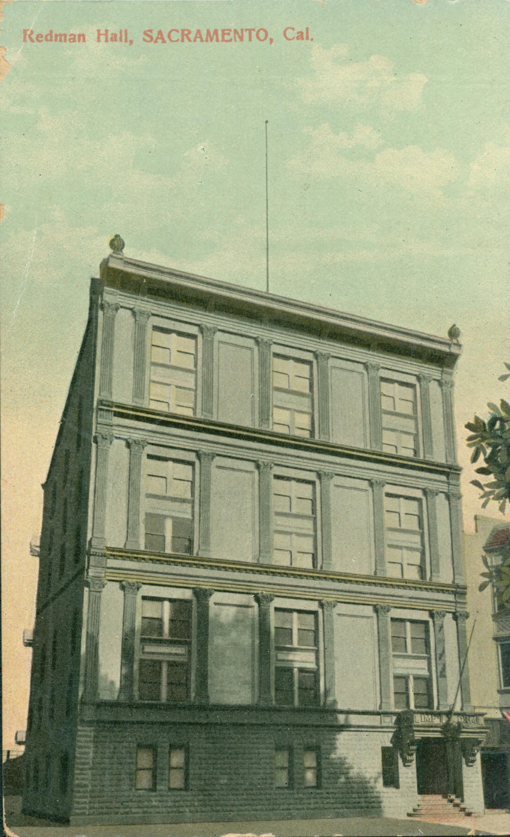 This postcard shows the front façade of Redman Hall